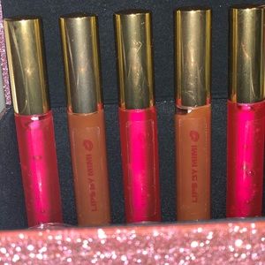 LIP GLOSS AND LIP SCRUB. Buy one get a free mini.